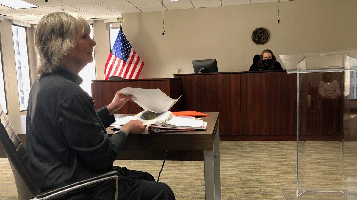 Macon’s Diane Vann listens to an assistant attorney general challenging her State Senate District 18 candidacy during an Administrative Law Judge hearing May 19.