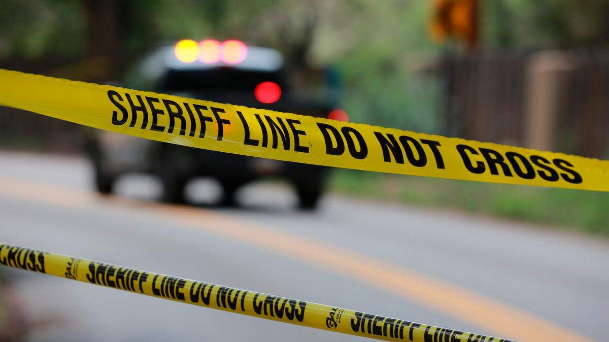 A man was arrested after officials said he created his own roadblock and shot an accused thief in Oregon. 