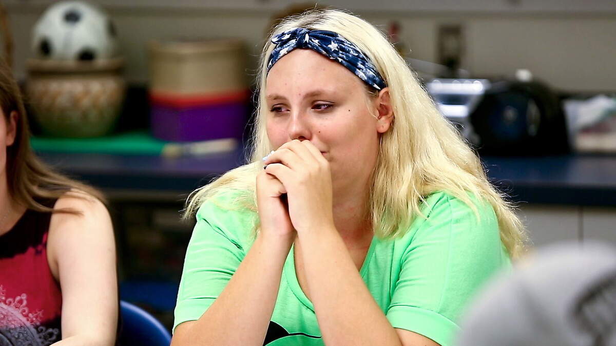 Sarah Shandor discusses the death of her mother during a teen group meeting at Highmark Caring Place in Pittsburgh. Each member of the group lost a parent to sibling to death and met several times over a 16-week period to discuss their grief. The stories of six members of the group are told in the Post-Gazette documentary, "Journeys Out of Grief."