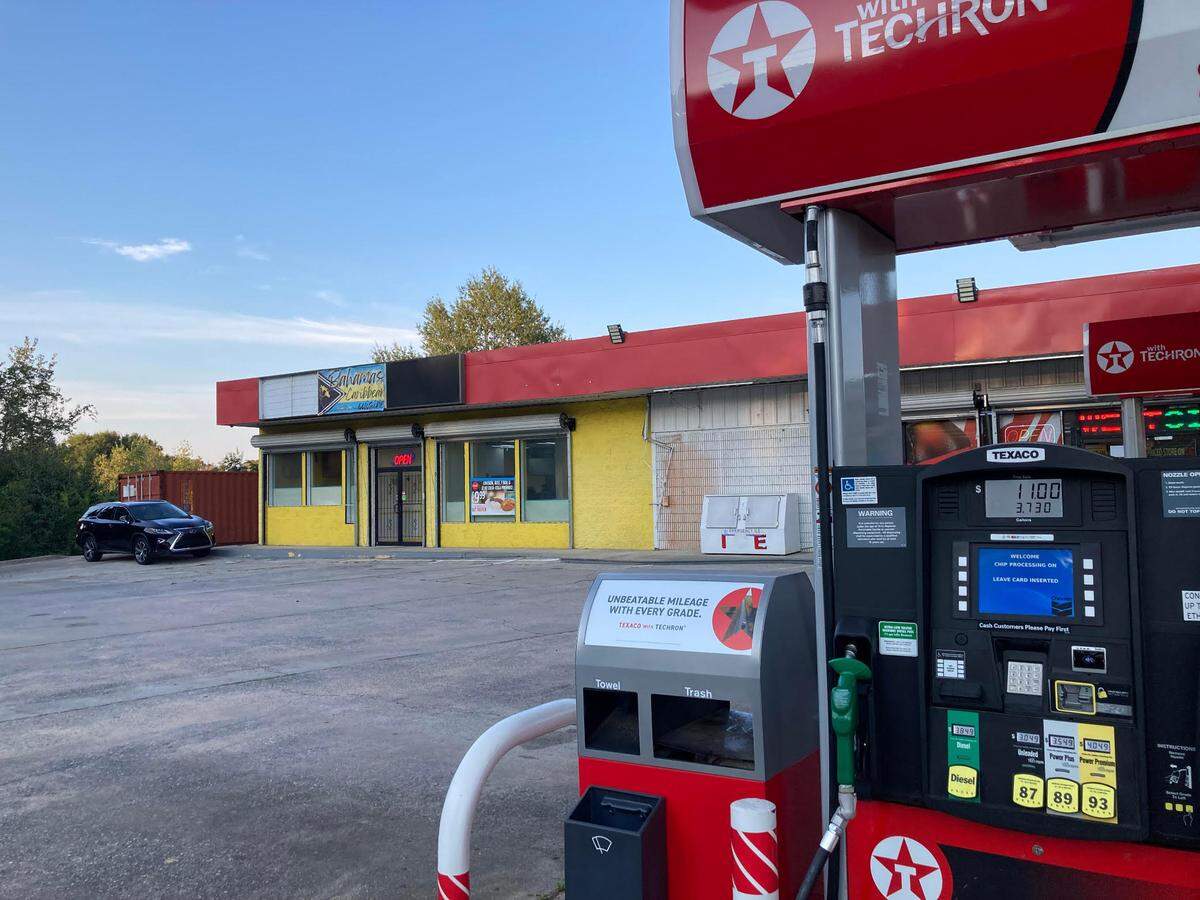 Bahamas Caribbean Cuisine shares a building with a Texaco gas station and convenience store at 700 North Davis Drive in Warner Robins, Georgia. The new restaurant in separate space from the convenience store serves authentic Bahamian food.