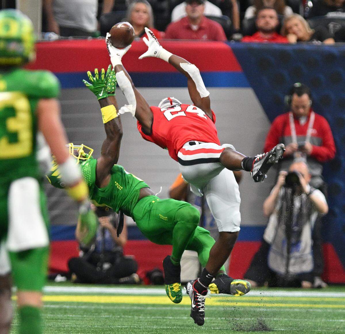 Georgia defensive back Malaki Starks (24) hauls in an interception during the Bulldogs’ 49-3 win over Oregon Saturday in Atlanta.