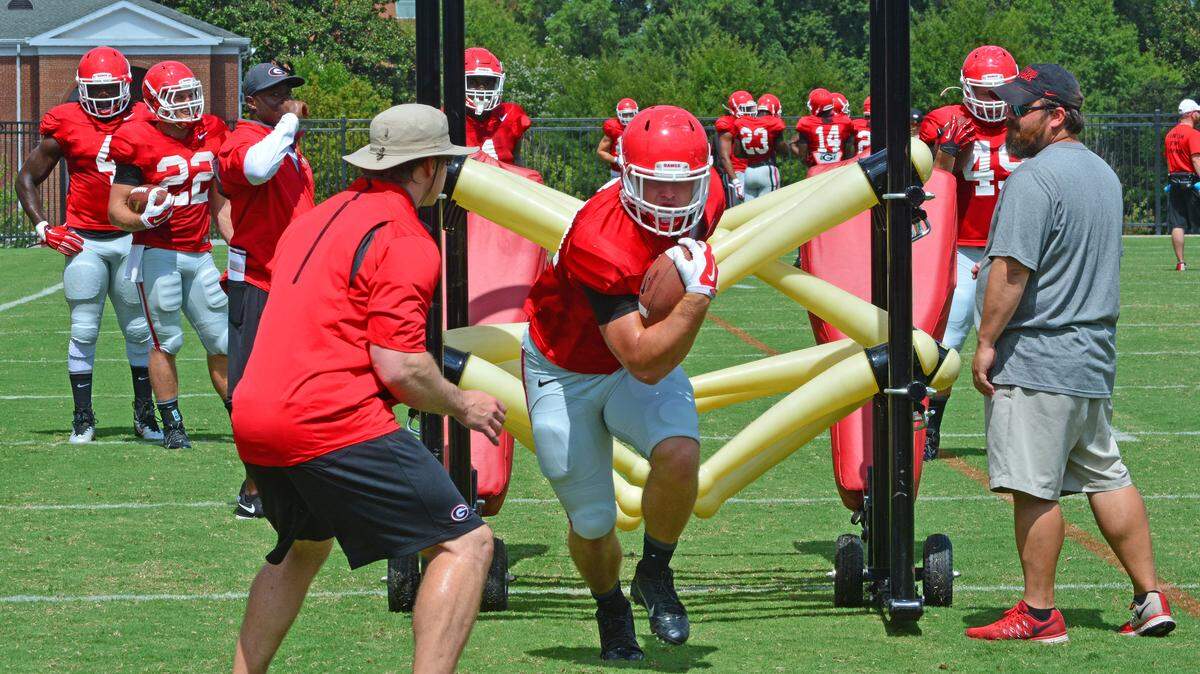 Georgia running back Christian Payne (41) goes through a drill during the Bulldogs' session on the Woodruff Practice Fields on Saturday, Aug. 8, 2015, in Athens, Ga. (Photo by Steven Colquitt)