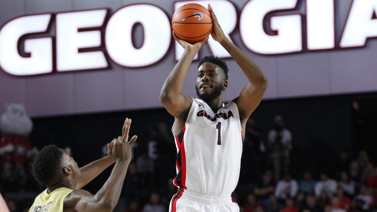 Georgia forward Yante Maten puts up a shot against Georgia Tech.