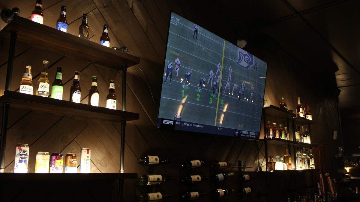 Wine, beer and liquor are displayed on the wall of the full-service bar at Parish on Cherry, 580 Cherry St. in Macon, Georgia.