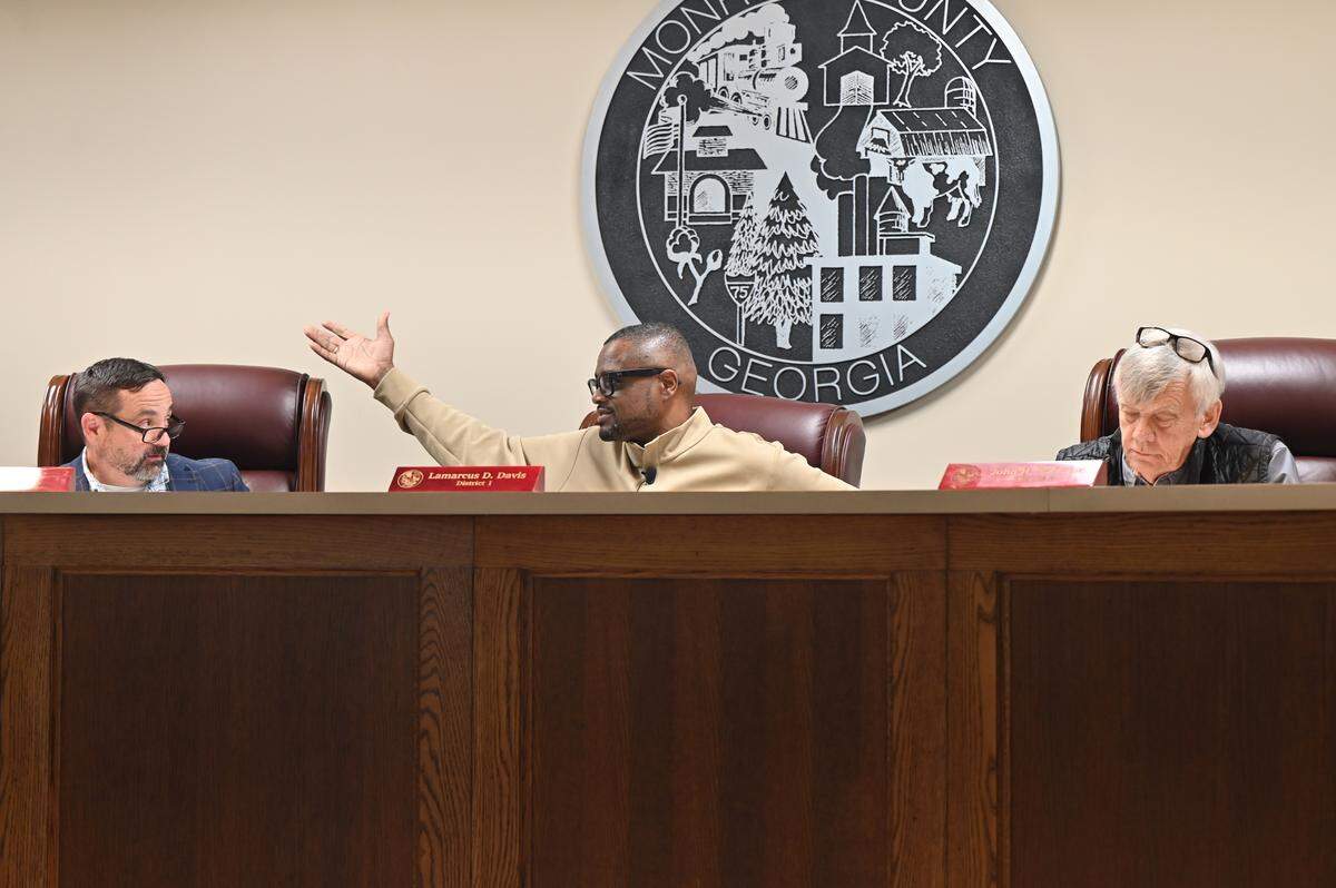 Monroe County Chairman Alan Gibbs (left), Commissioner Lamarcus Davis (middle) and Commissioner John Ambrose discuss changes to the buffer zone guidelines for data center development during a county commission meeting on Tuesday, March 3, 2026, in Forsyth, Ga. The commission voted to table a decision to amend the county’s Unified Development Ordinance (UDO) surrounding data centers until next meeting, so that they can to make several changes before voting.