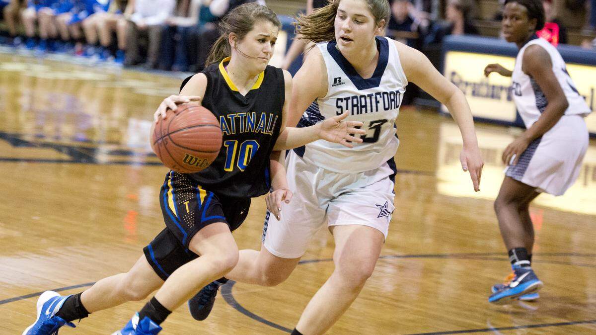 Tattnall Square's Blair Black (10) drives by Stratford's Carey Woodcock (13) during their game Friday night.