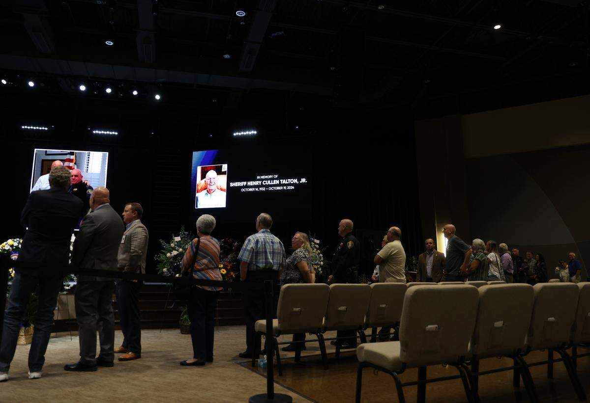 People line up to pay respects at the visitation for the late Houston County Sheriff Cullen Talton on Tuesday, Oct. 22, 2024, at Southside Baptist Church in Warner Robins, Georgia. Sheriff Talton died peacefully on Saturday at age 92 and served nearly 52 years as sheriff.
