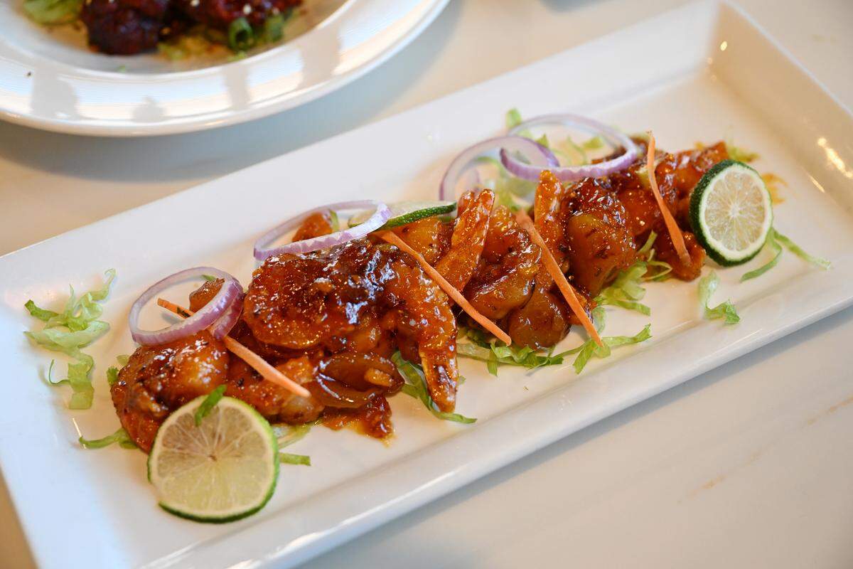 Chili Mango Shrimp is one of the most popular appetizers at 7 Spices Authentic Indian Restaurant & Bar. It features sweet & spicy jumbo shrimp with mango and a ginger glaze.