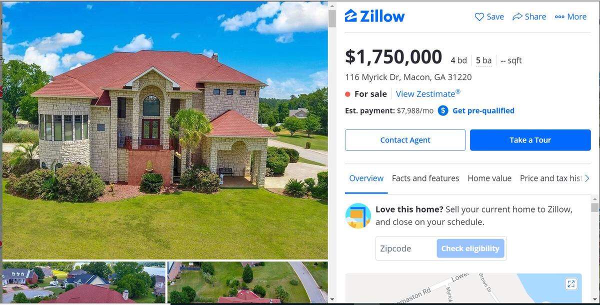 This home located just off of Lake Tobesofkee has for bedrooms, four full bathrooms and one half bathroom.