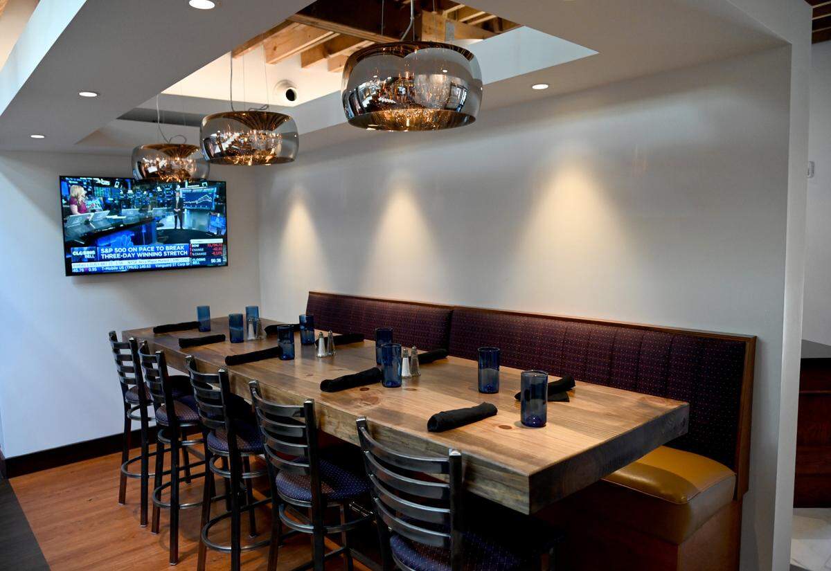 Community table at ‘Orleans on Carroll Street at 807 Carroll St. in downtown Perry.