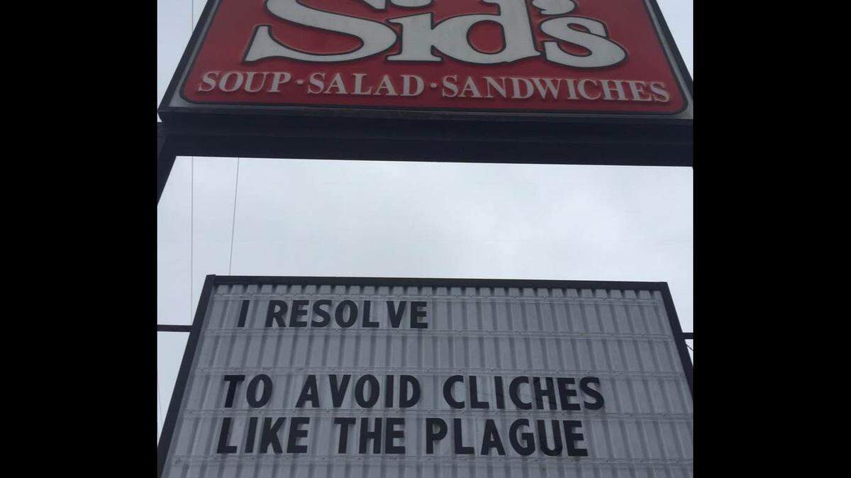 A sign outside Sid’s Sandwich Shop.