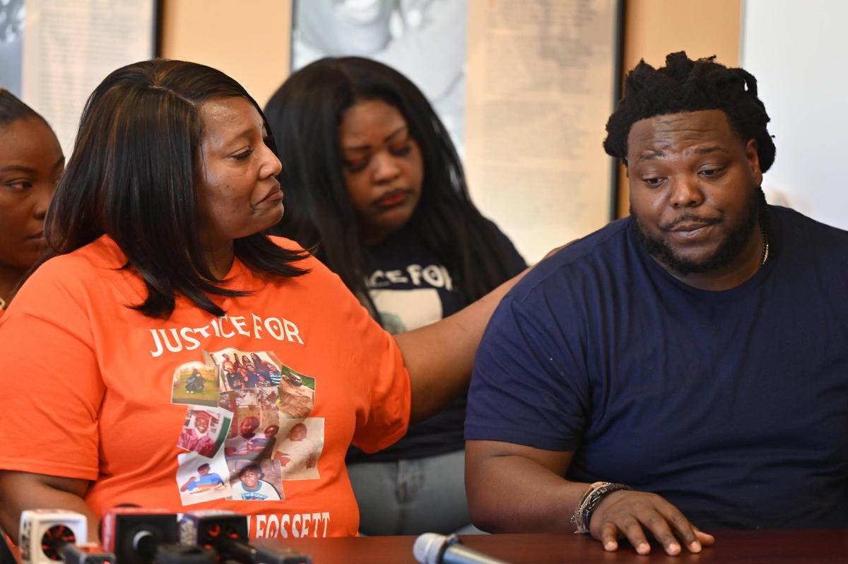 Mother of Stephen Fossett Paula Platt (left) comforts her son Keshawn Fossett at the conclusion of a press conference giving an update on the future of the investigation of Stephen Fossett’s death at the Bibb County Jail on Thursday, April 10, 2025, at the Tubman Museum in Macon, Georgia. The press conference came after Macon Judicial Circuit District Attorney Anita R. Howard ruled on Wednesday that no criminal charges will be pursued against the officers who tased Fossett, leading to his May 2024 death in custody.