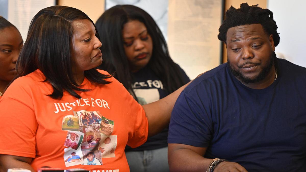 Mother of Stephen Fossett Paula Platt (left) comforts her son Keshawn Fossett at the conclusion of a press conference giving an update on the future of the investigation of Stephen Fossett’s death at the Bibb County Jail on Thursday, April 10, 2025, at the Tubman Museum in Macon, Georgia. The press conference came after Macon Judicial Circuit District Attorney Anita R. Howard ruled on Wednesday that no criminal charges will be pursued against the officers who tased Fossett, leading to his May 2024 death in custody.