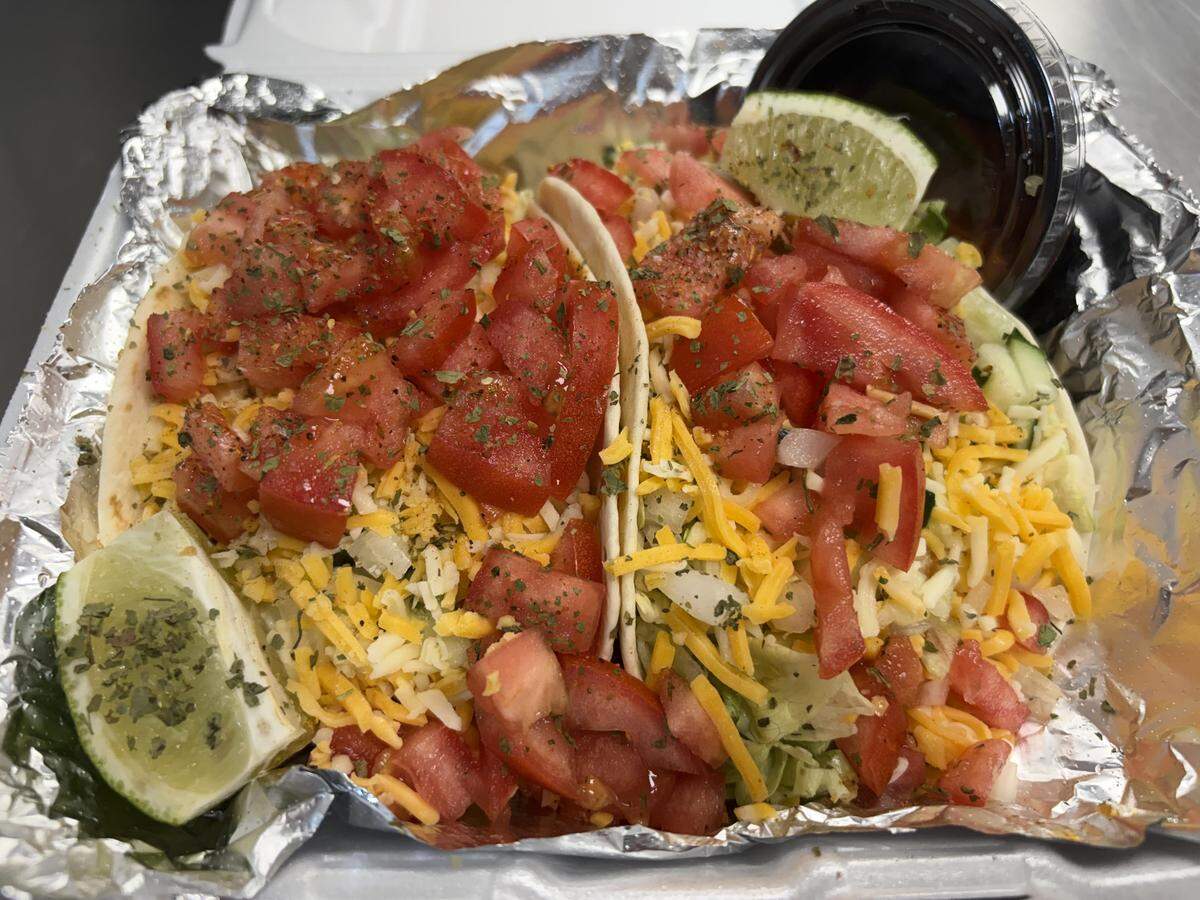 Sweet chili chicken tacos from Soulful Eats on Taco Tuesday at the takeout only spot inside an ExtraMile convenience store at the Chevron gas station at 2062 Watson Blvd., Suite A.