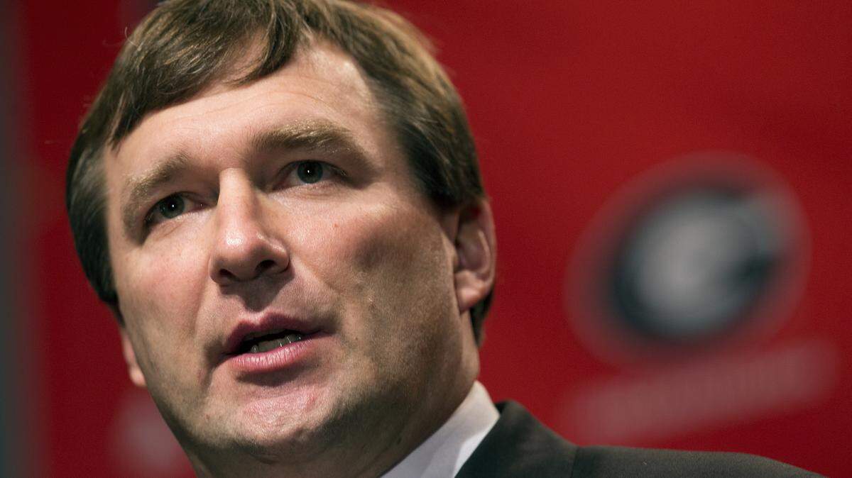 File- This Dec. 7, 2015, file photo shows Alabama defensive coordinator Kirby Smart listens to a question from a reporter during a press conference where he was introduced as Georgia's new head football coach in Athens, Ga. Smart, who replaced Richt on Dec. 6, will be on campus after coaching next Monday, Jan. 11, 2016, in the national title game against Clemson. Smart already has one big goal accomplished after quarterback Jacob Eason, one of the nationís top recruits, decided to keep his commitment and enroll at Georgia this month. (AP Photo/John Bazemore, File)