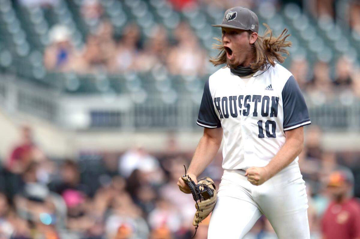 Houston County pitcher Brodie Chestnutt (10) celebrates after a strikeout during game one of the BearsÕ GHSA 6A Championship series against Lassiter Wednesday in Atlanta.