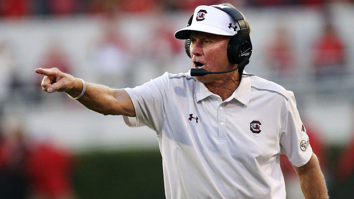 FILE - In this Saturday, Sept. 19, 2015, South Carolina coach Steve Spurrier directs his team from the sideline during the first half of an NCAA college football game against Georgia in Athens, Ga. Spurrier is returning to coaching in the newly formed Alliance of American Football league (AP Photo/John Bazemore, File)