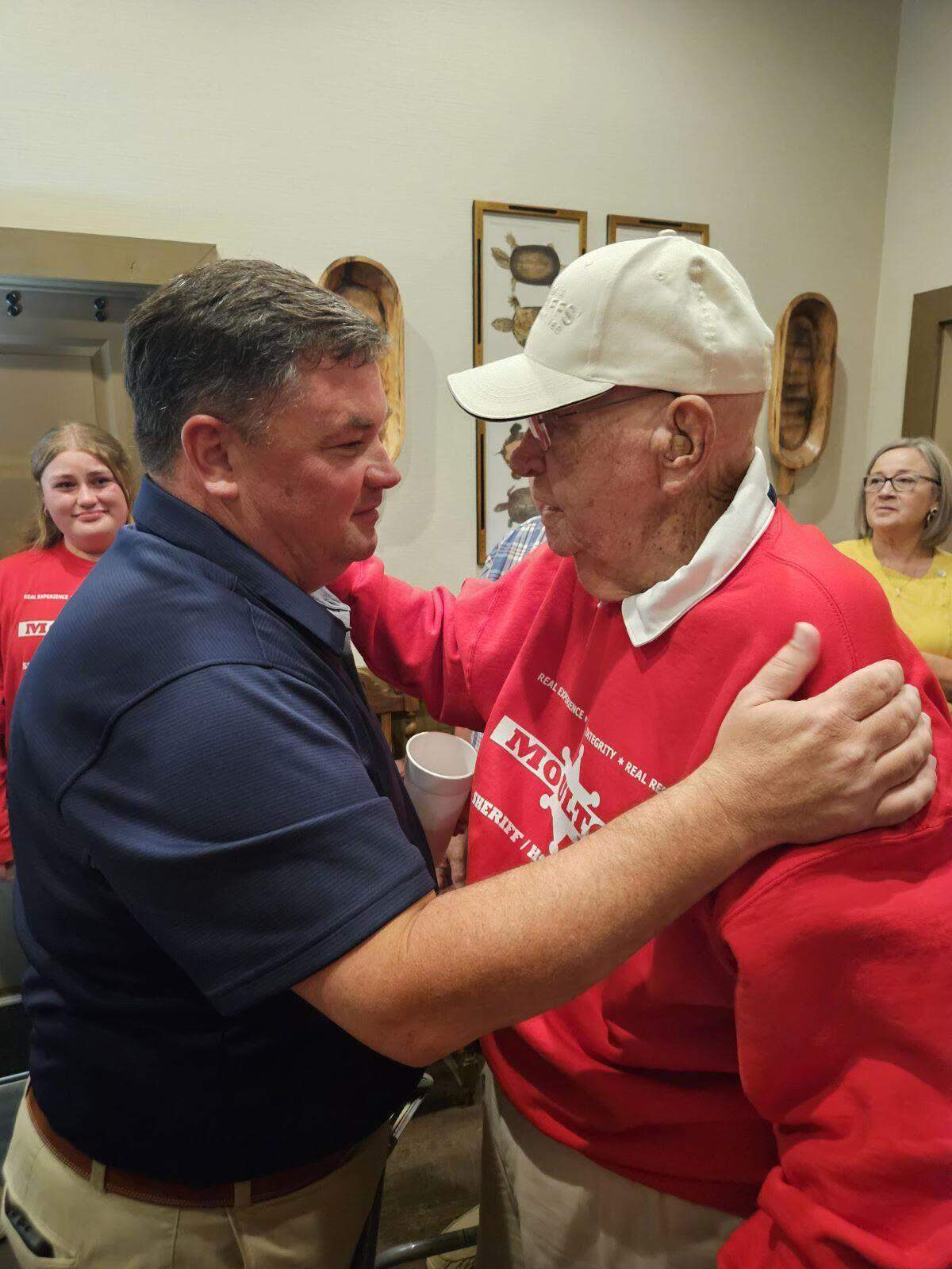 Incoming Houston County Sheriff Matt Moulton, left, and the late Houston County Sheriff Cullen Talton the night of the May 21, 2024 primary. Moulton’s daughter, Mattilyn “Matti” Moulton, a sophomore at Veterans High School, looks on, far left.