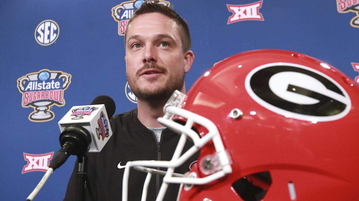 Dan Lanning, assistant coach outside linebackers, takes questions during the Georgia defense press conference on Saturday, Dec. 29, 2018, in New Orleans. Georgia will face Texas in the Sugar Bowl NCAA college football game on Jan. 1, 2019. (Curtis Compton/Atlanta Journal-Constitution via AP)