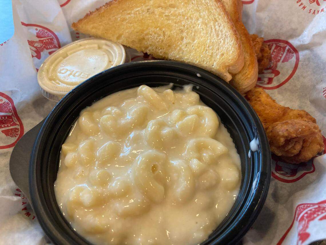 A kids meal of two chicken tenders and mac and cheese instead of fries at a Slim Chickens in Callaway, Florida.