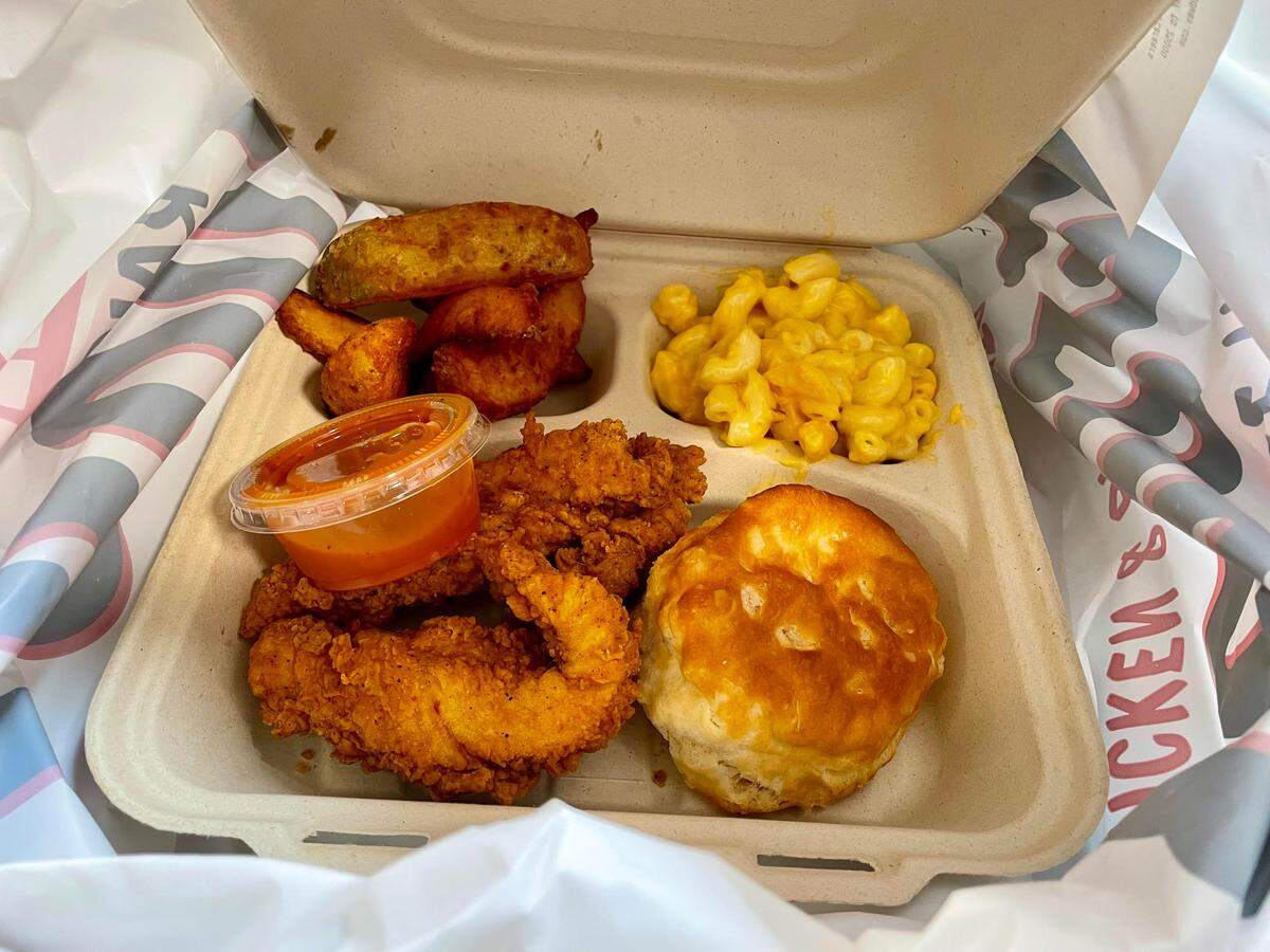 A $5.99 plus tax big tender box from Raise the Roost Chicken & Biscuits. The meal deal also includes a drink (not pictured).