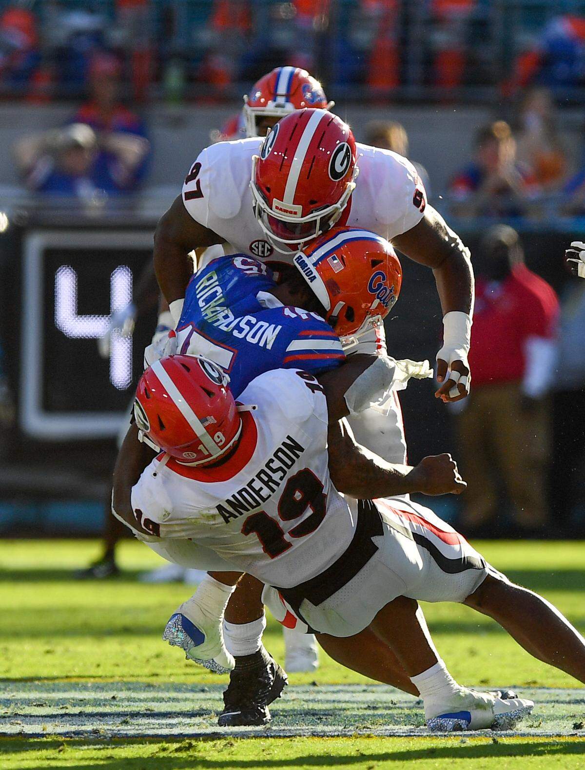 DONN RODENROTH,Jacksonville, Florida, 10/30/2021: Florida quarterback Anthony Richardson is sacked by Georgia Bulldog Adam Anderson Saturday as the Dawgs rolled over the Gators 34-7.
