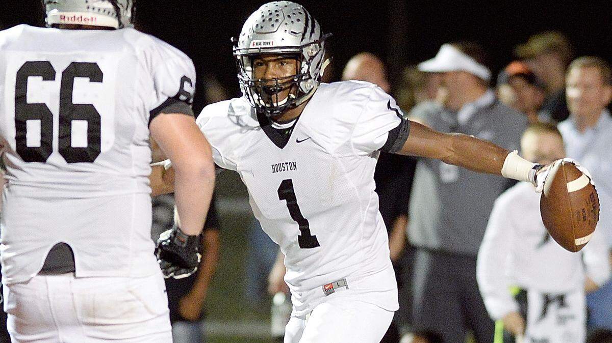 Houston County wide receiver Darion Anderson (1) celebrates a touchdown reception from quarterback Jake Fromm (11) during last Friday's win over Northside.