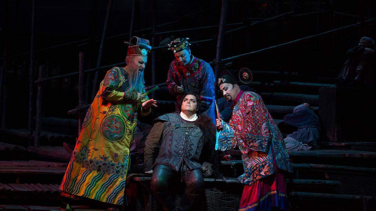 MARTY SOHL/METROPOLITAN OPERAMarco Berti, center, plays Calaf in the Metropolitan Opera's production of"Turandot," which will be broadcast live in high definition Saturday at the Douglass Theatre in Macon and at the Galleria Mall Stadium Cinemas 15 in Warner Robins.
