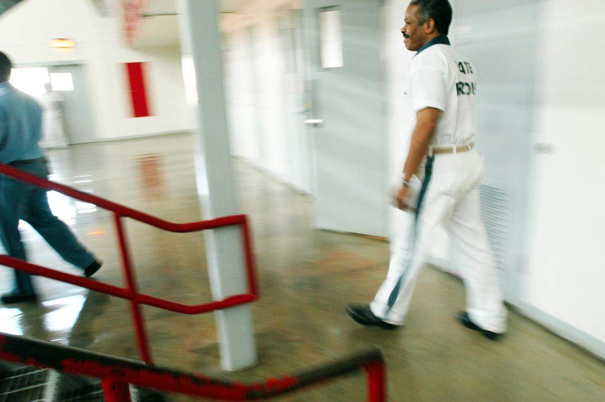 Lafayette Hall walking inside Hancock County State Prison in late 2003.