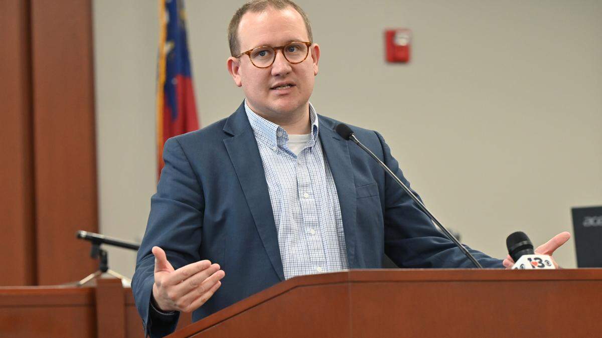 Houston County District Attorney Eric Edwards speaks on Friday, May 30, 2025, at the Houston County Superior Courthouse in Perry, Georgia. Edwards announced Monday the prison sentence of a man who went on what he called a ‘public indecency spree.’