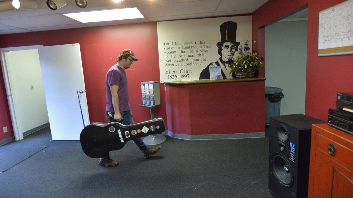 BEAU CABELL/THE TELEGRAPHSteven Jarvis heads to work at the old Tubman Museum, where bands find a great space to practice their craft.