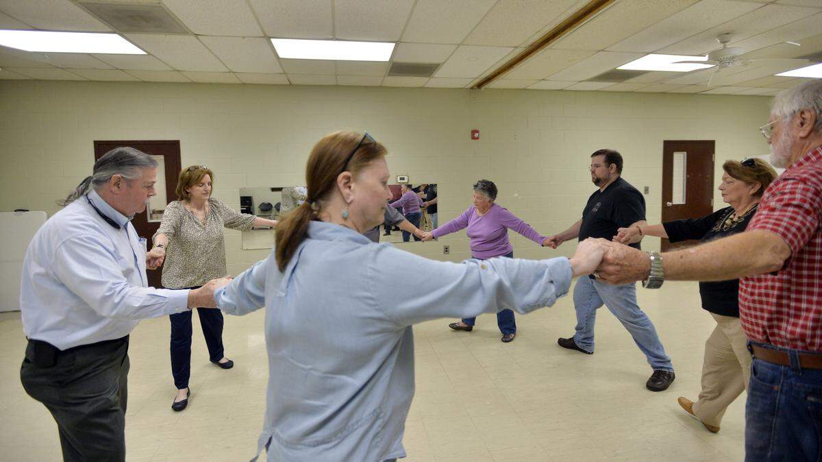 1800s Dance Club members rehearse their 19th century routines last month at the North Macon Park Community Center.