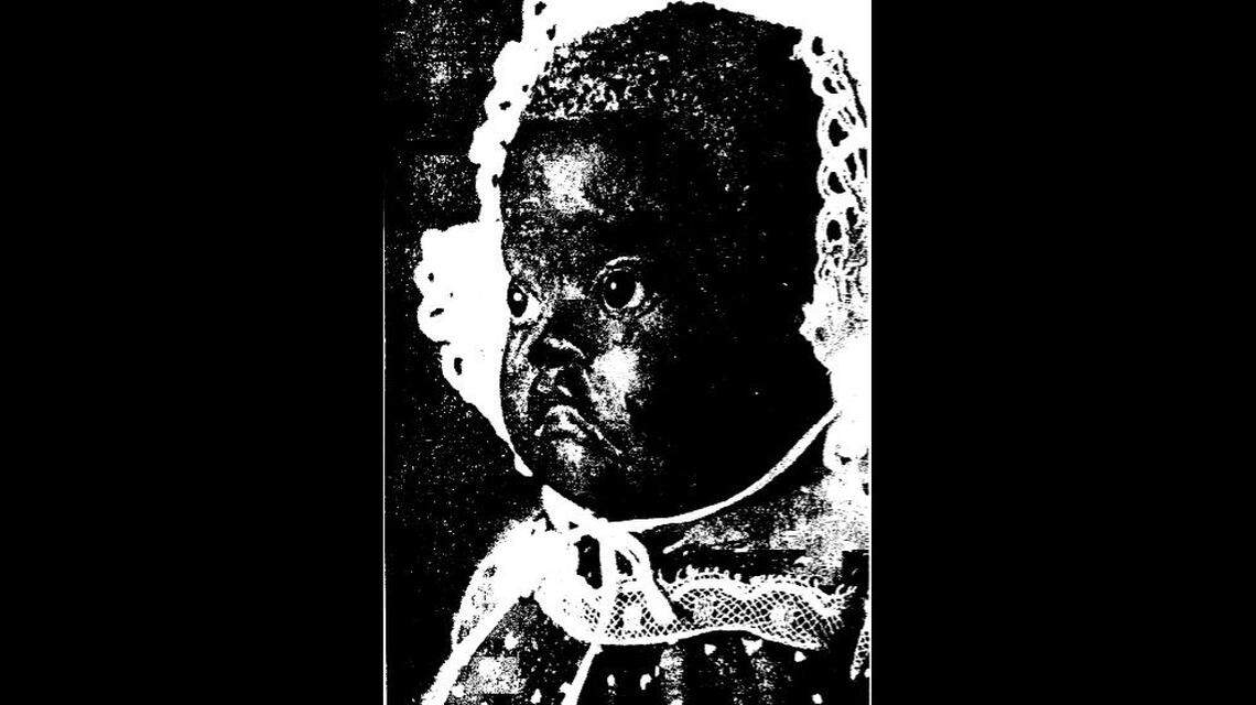 Tears stream down Iris’ face as she stares out from a lace bonnet. Iris is the creation of dollmaker Leo Moss. Iris was on loan to the Museum of Arts and Sciences in Macon, Georgia, for an exhibit there in 1988.