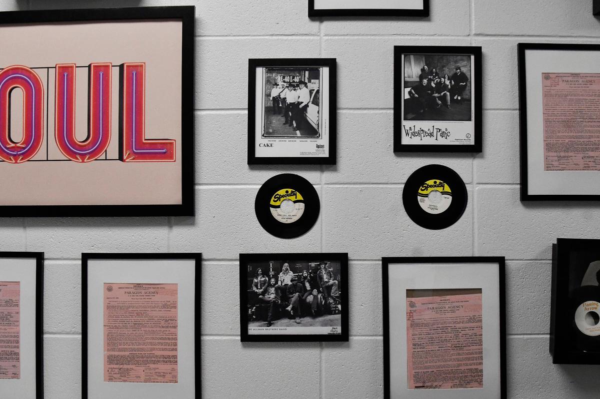 Memorabilia from Macon music history sits on the walls of the back hallways of Atrium Health Amphitheater on Friday, May 31, 2024, in Macon, Georgia. The 12,000 seat Atrium Health Amphitheater opened in March and will host a number of events in the upcoming months.