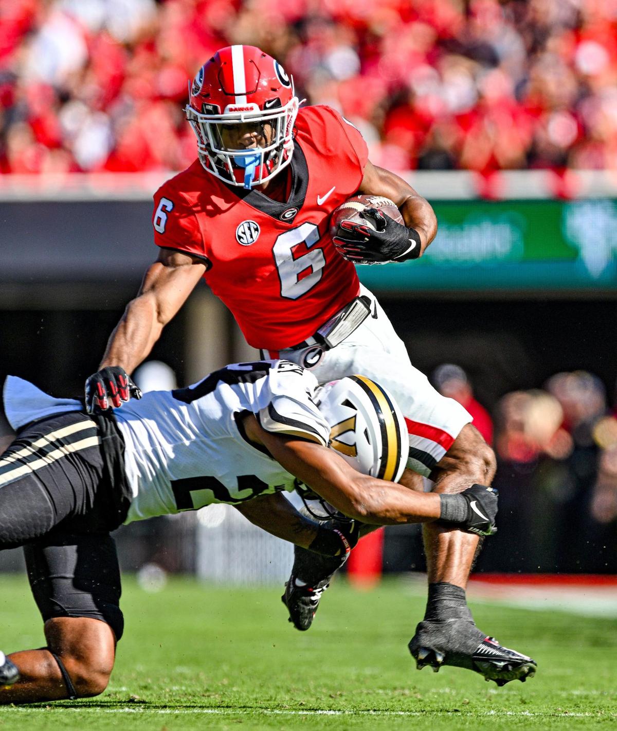 Georgia running back Kenny McIntosh gets up-ended on his to a Georgia first down against Vanderbilt Saturday in Athens.
