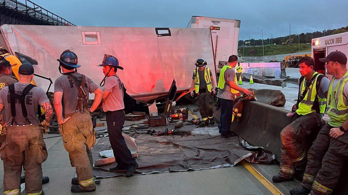 Eight firefighters from the Macon-Bibb County Fire Department responded to a fatal crash involving a semi-truck on Wednesday, Aug. 6, 2025, on Interstate 16 Eastbound in Macon, Ga. The truck was tilted on its side and the front end was totaled.