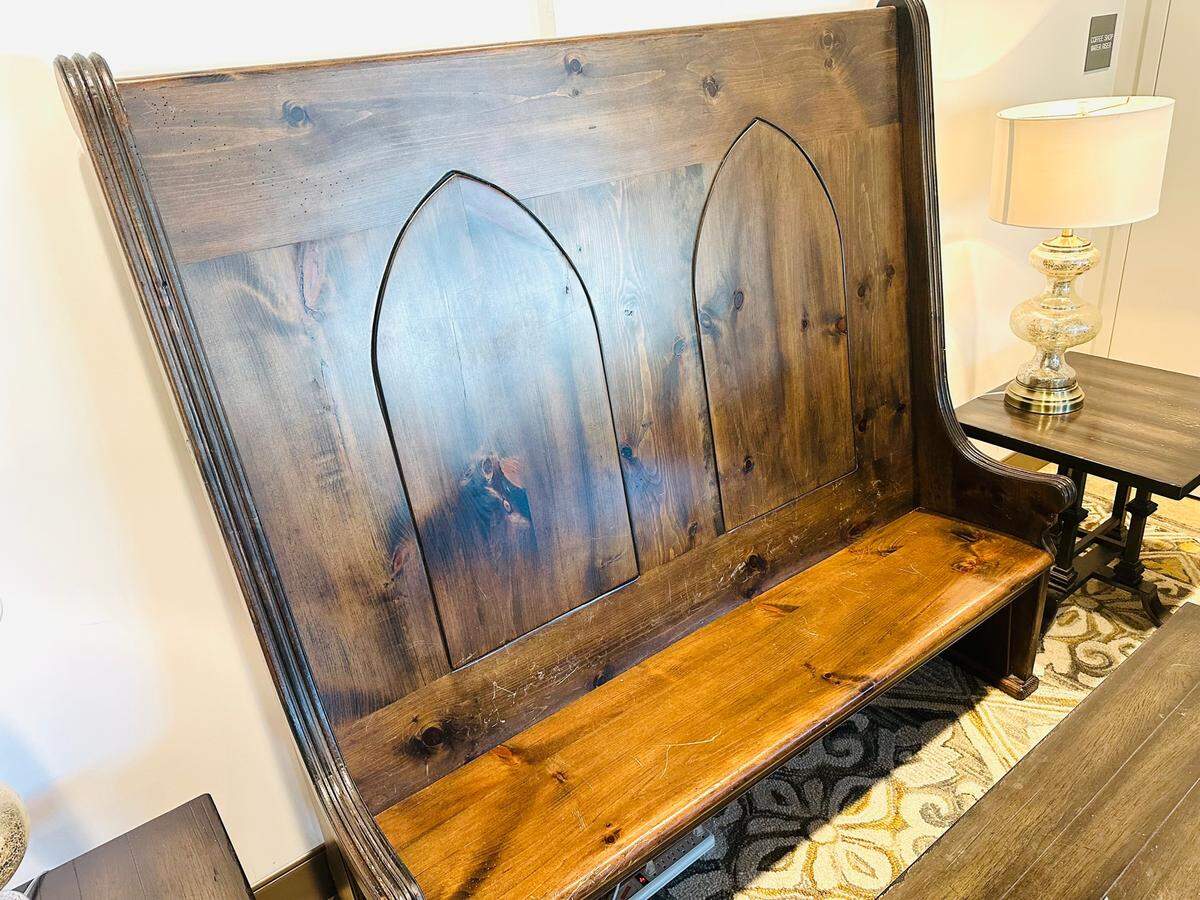 Wooden pews inside Cathedral Coffee