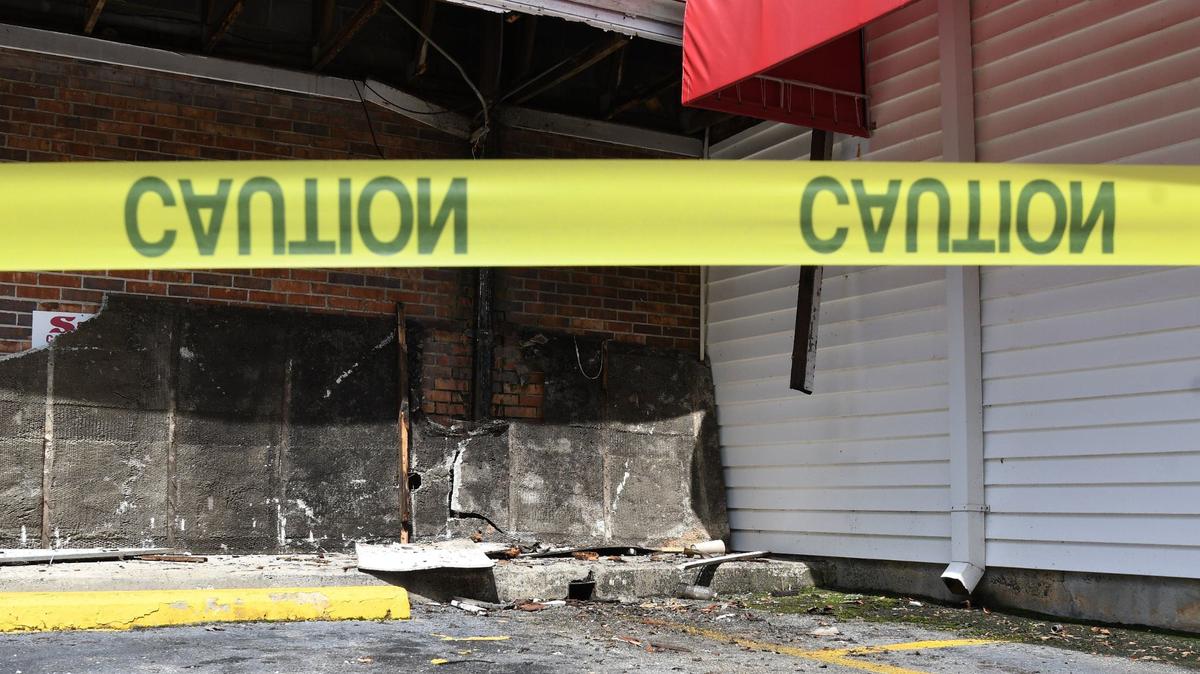 Fire damage sits behind caution tape at S&S Cafeteria on Monday, Sept. 30, 2024, in Macon, Georgia. The restaurant caught fire late Sunday evening and will be closed until further notice.