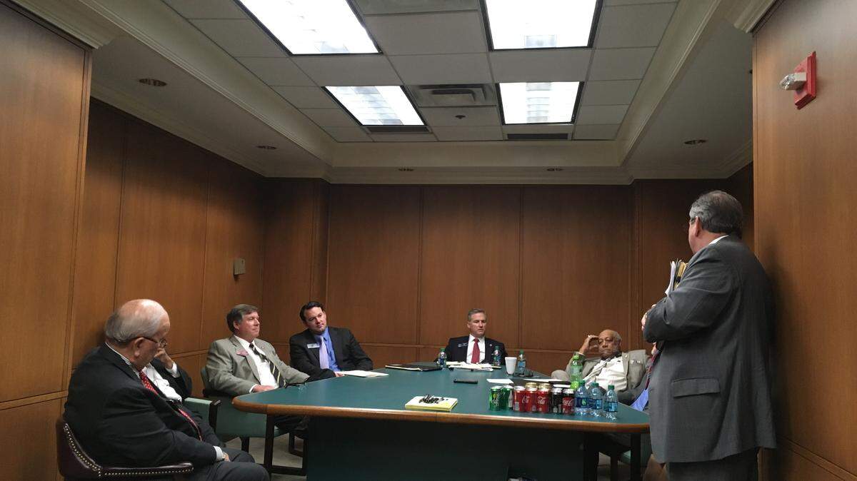 Macon-Bibb Mayor Robert Reichert looks on Monday at the state Capitol as county lawmakers discuss setting up a public vote on a new sales tax.