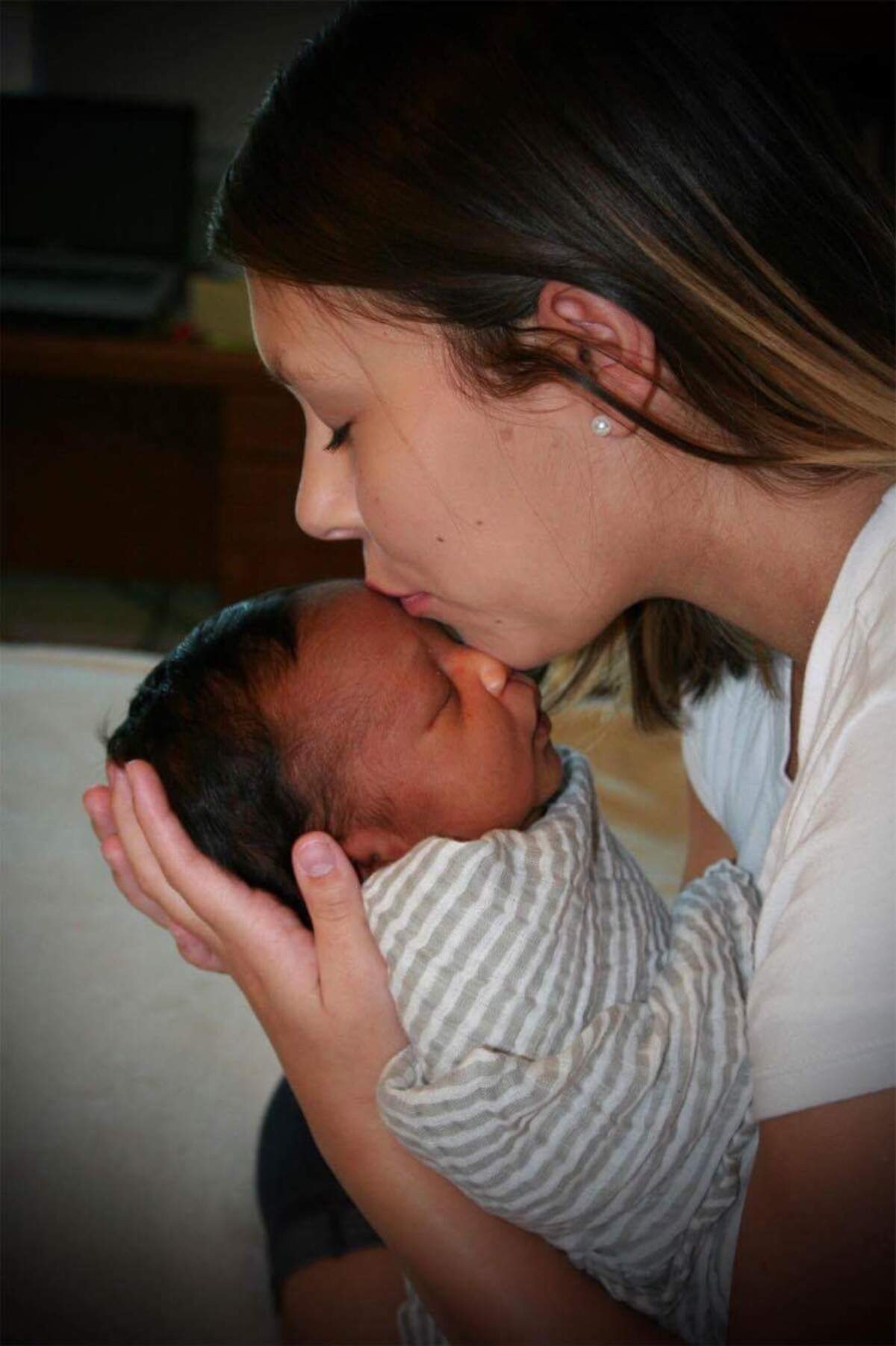 ‘I couldn’t imagine my life without you,’ says Jasmine Gerald, right, of her son, Caleb Gerald, left. She made an appointment for an abortion after getting pregnant her senior year of high school, but is grateful she chose not to go through with it.