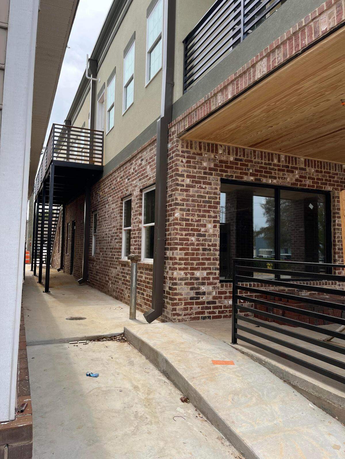 Construction is complete on The Commodore Building, a two-story building at 904 Commerce St. that offers an ideal space for a first-floor restaurant and features three short-term lofts (outdoor entrance pictured above) in downtown Perry. The lofts are expected to be ready soon.