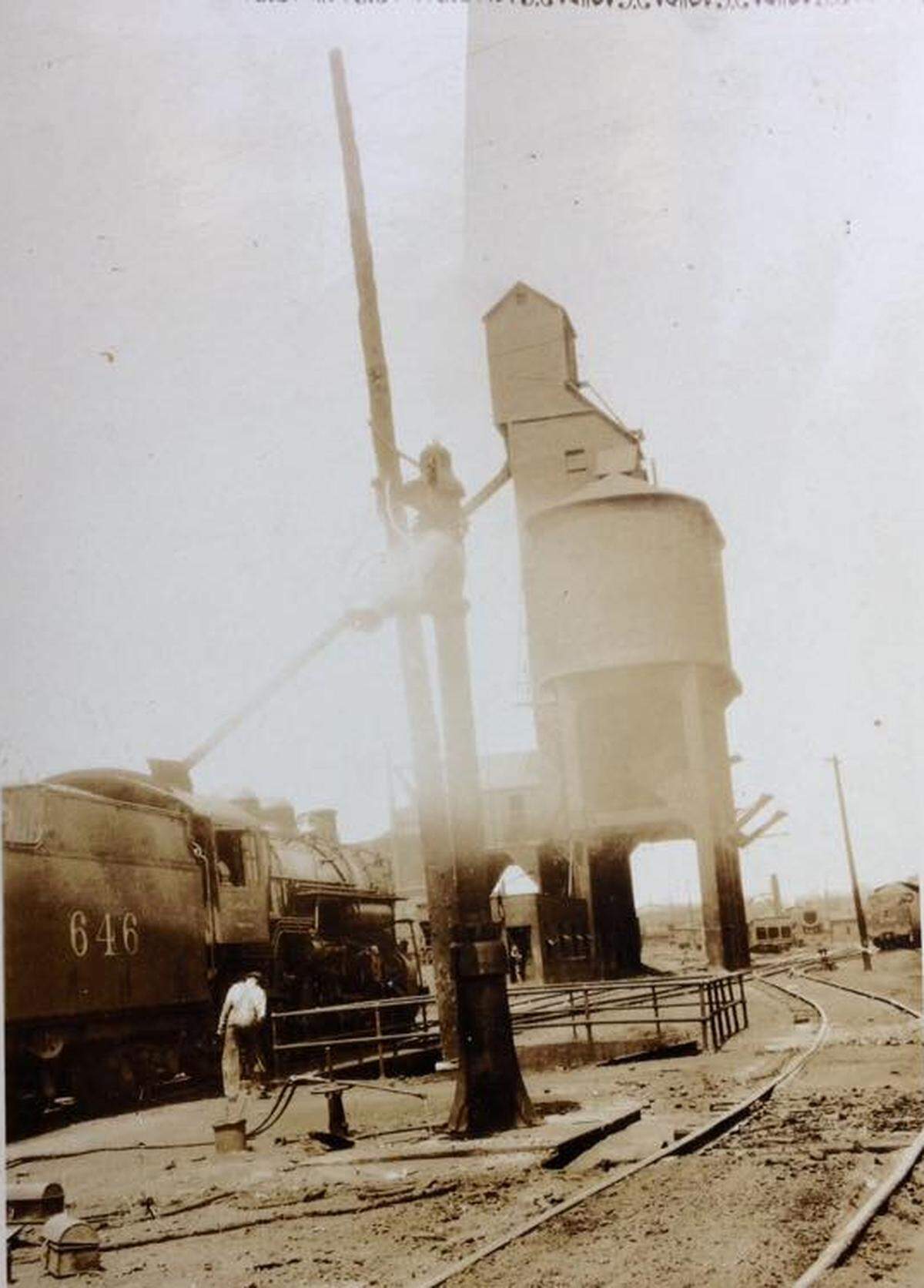 Dating back to 1933, this picture shows the old Coal Tower on 861 Seventh Street feeding coal into a locomotive on the Central of Georgia Railroad.