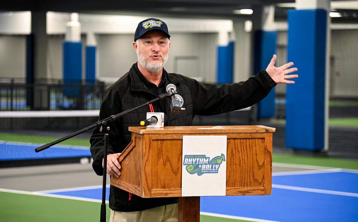 Macon-Bibb County Mayor Lester Miller announces the name of the new indoor pickleball facility on Nov. 28. The Rhythm and Rally Sports and Events Center is two stories featuring 32 courts along with lockers, showers, and a pro shop.