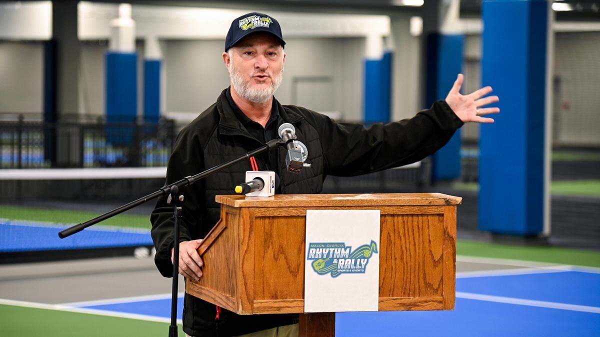 Macon-Bibb County Mayor Lester Miller announces the name of the new indoor pickleball facility on Nov. 28. The Rhythm and Rally Sports and Events Center is 2 stories featuring 32 courts along with lockers, showers, and a pro shop.