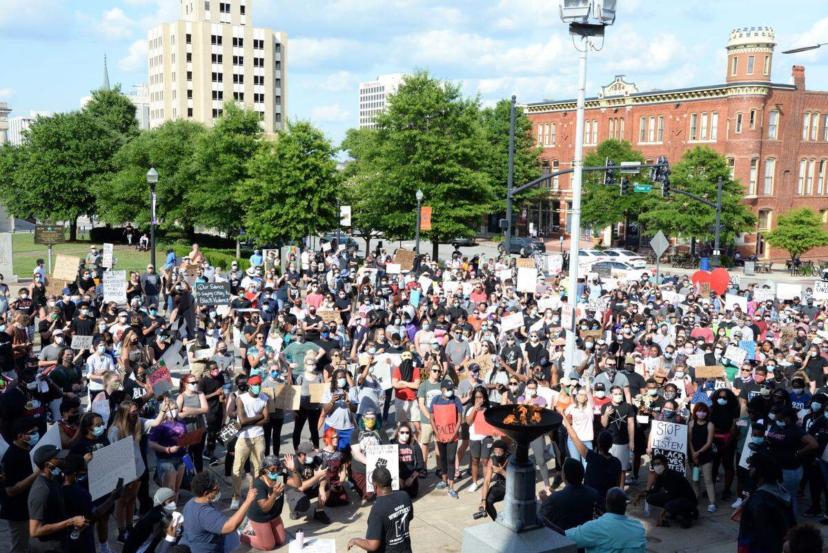 Hundreds of Middle Georgians gather in front of city hall Tuesday night during a march through downtown Macon. The peaceful march was escorted by Bibb County Sheriff’s deputies and began and ended in front of the Tubman Museum.
