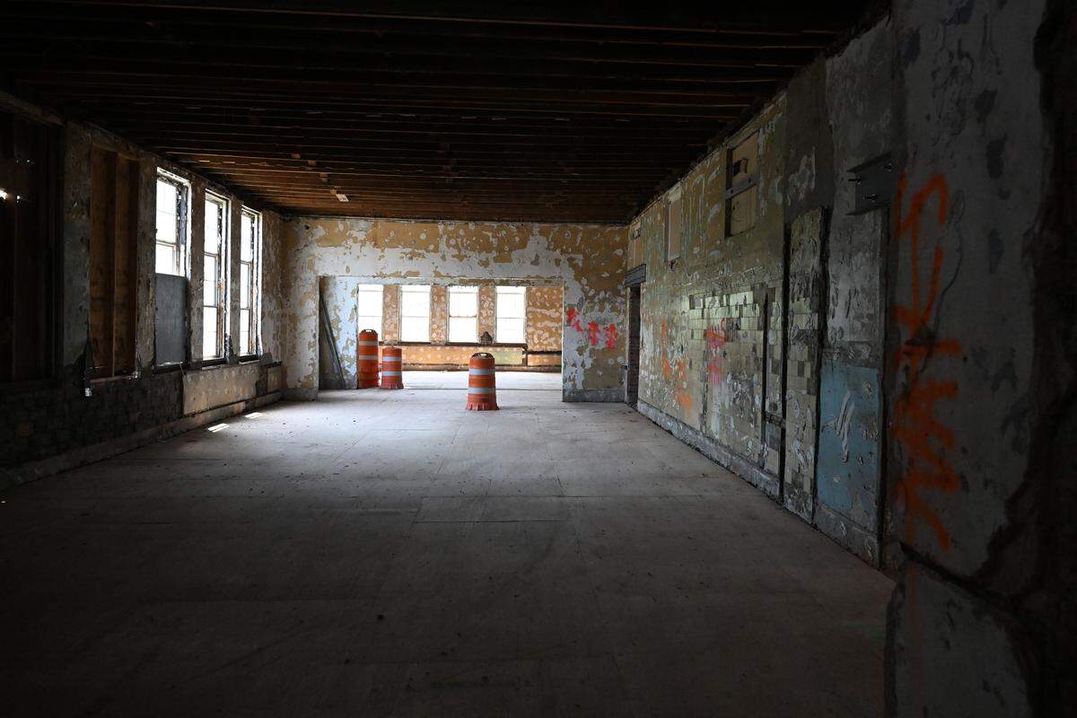 Orange cones and stripped walls sit inside of the under construction One Safe Place Macon in Macon, Ga., on April 22, 2026. The family justice center is expected to house 18 agencies in one building that will ease barriers to help for victims of abuse.