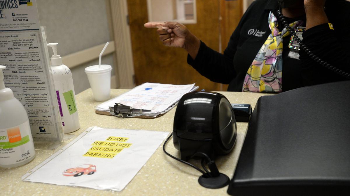 A sign at the front desk of the Family Birth Center at Medical Center, Navicent Health, tells visitors that parking will no longer  be validated.