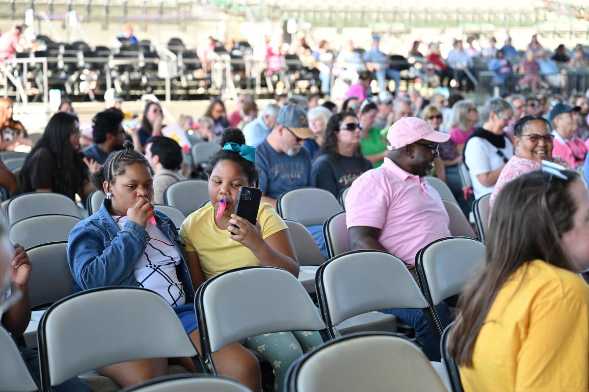 Participants practice playing their kazoos before the start of the Guinness World Record attempt for largest kazoo ensemble on Friday, March 28, 2025, at the Atrium Health Amphitheater in Macon, Georgia. Over 1,000 participants came out for the event, but their third record attempt failed to meet the mark for the record.