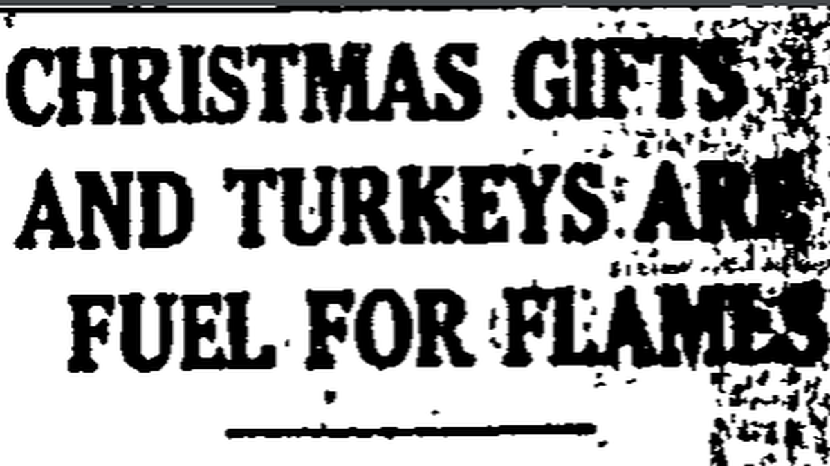 A front-page headline from The Telegraph in December 1920 about a warehouse fire along Broadway in downtown Macon.