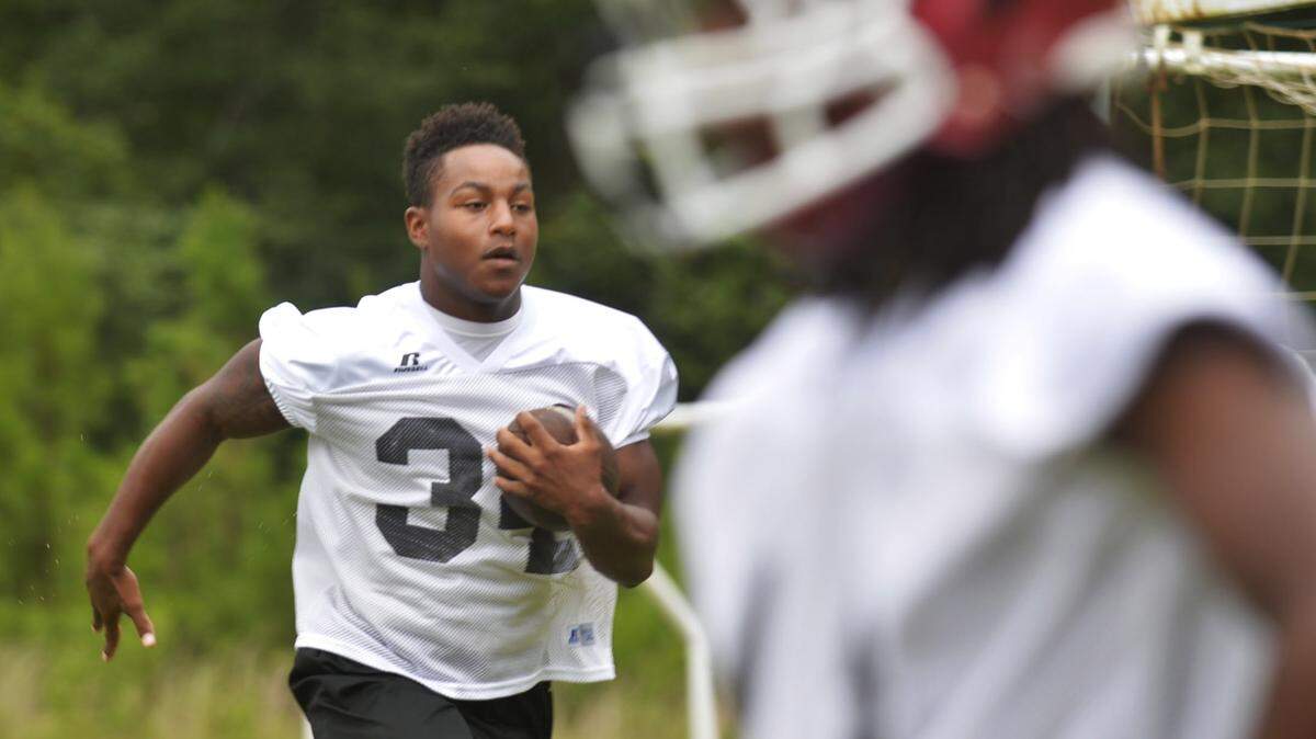 Howard running back Jaqwun Stinson and the Huskies finished 3-6-1 last season.